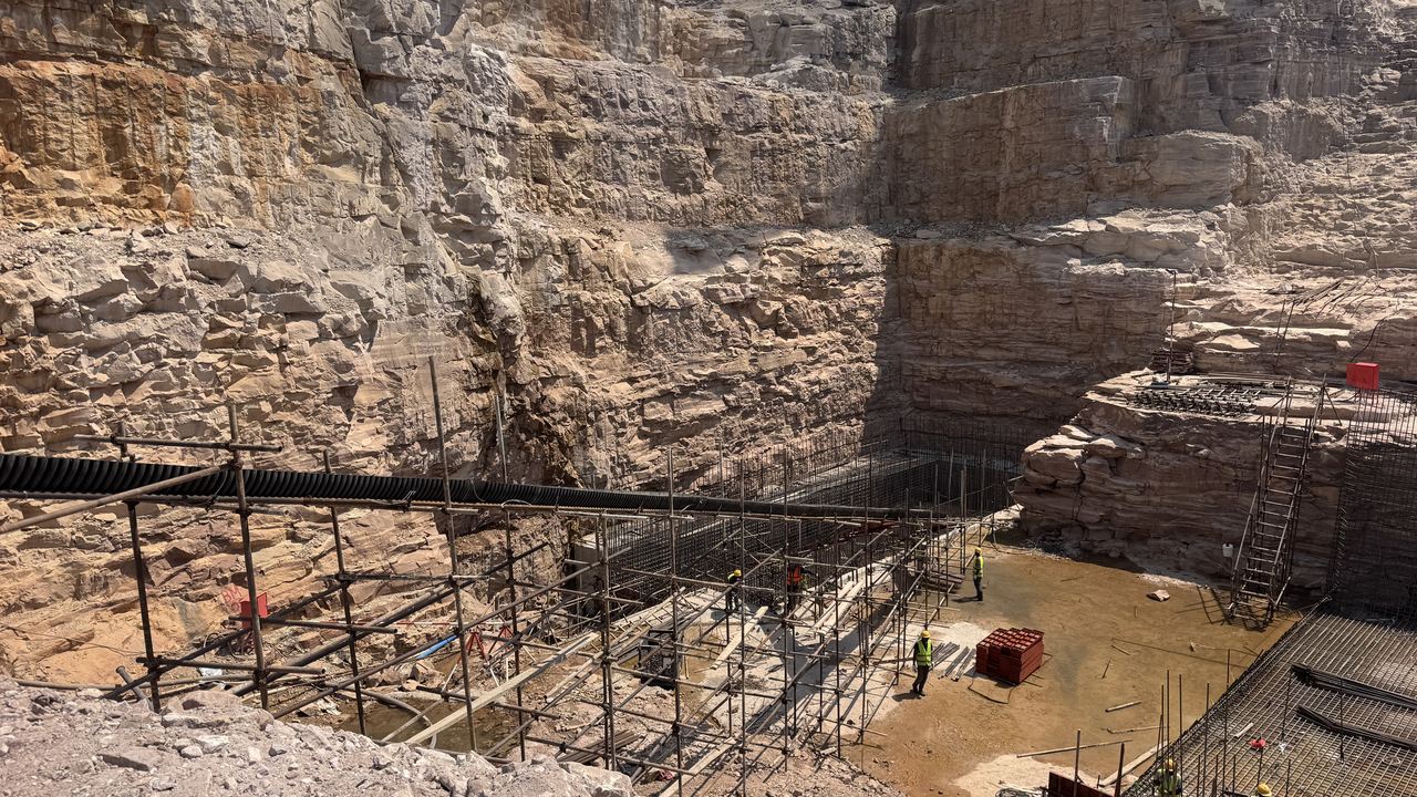 Scaffolding and walkways leading down into the powerhouse pit
