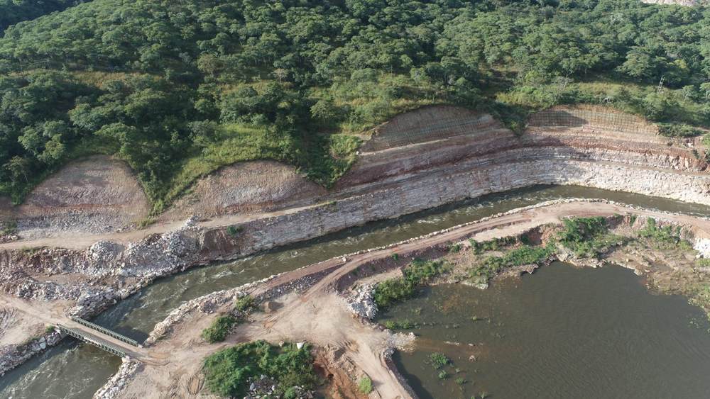 Diversion channel carrying the river, April 2026