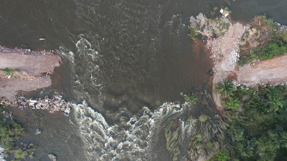 Downstream cofferdam and the river below the falls