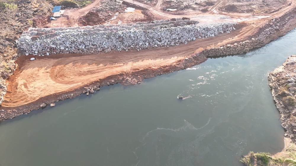 Diversion channel and downstream cofferdam